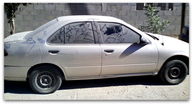 2 - 1 automovil robado en la paz sentra